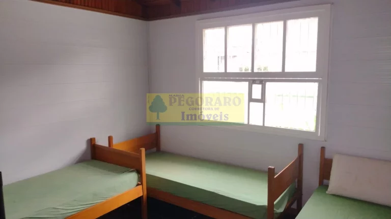 Imagem Imperdível Casa de 4 Quartos na Prainha, Caraguatatuba-SP: 2 Suítes, 2 Salas, 4 Banheiros, 4 Vagas de Garagem!