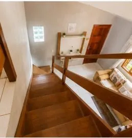 Imagem Casa 4 domitorios sendo uma suite com 6 vagas em 195m2 no bairro Guaruja.