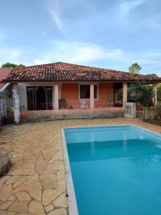Imagem A Chácara tem 1000m2de terreno, casa com 3 dormitórios, sala ampla, cozinha, até gourmet e uma á...