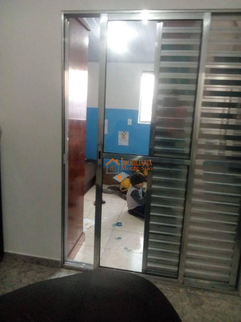 Imagem Casa com 3 dormitórios à venda, 125 m² por R$ 250.000,00 - Recreio São Jorge - Guarulhos/SP