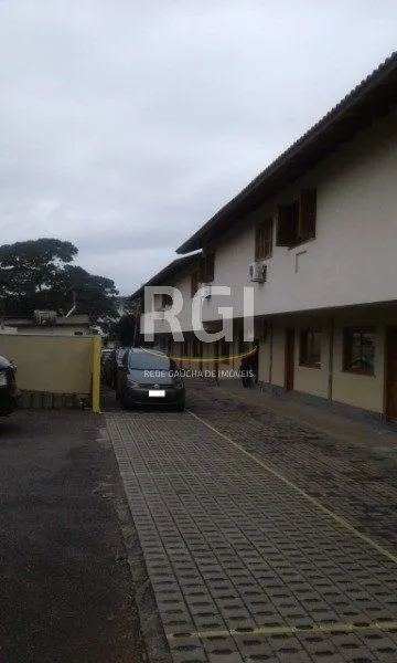 Imagem Casa Condominio para Venda - 77.6m², 2 dormitórios, 1 vaga - Partenon