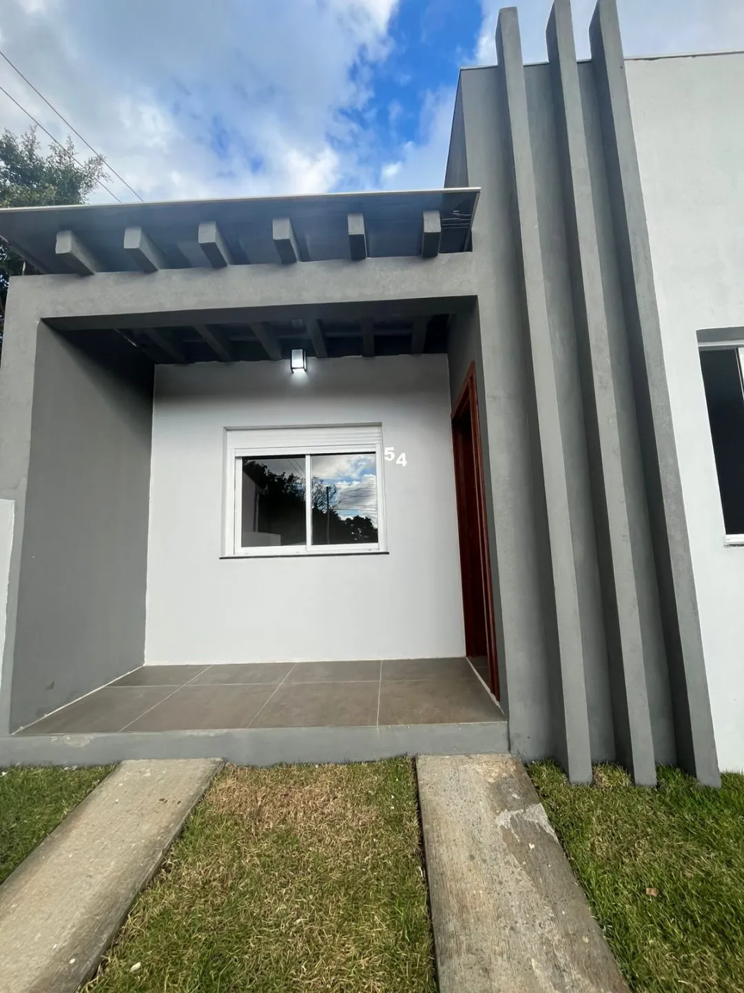 Imagem Casa Nova com Suíte, Lareira e Acabamento impecável