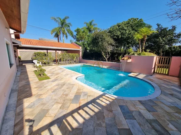 Imagem Mansão térrea de alto padrão à venda, 3 lotes de terrenos, com edículas