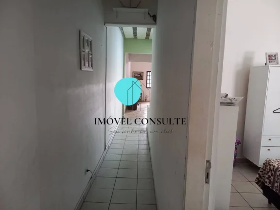 Imagem Oportunidade para Morar ou Investir! Sobrado Amplo com Renda de Locação.
