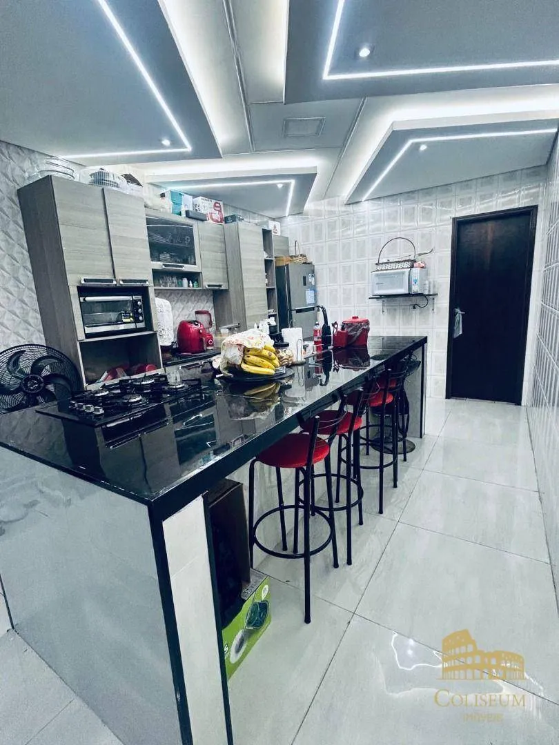 Imagem Casa com 3 dormitórios à venda, 171 m² por R$ 450.000,00 - Maracanã - Praia Grande/SP