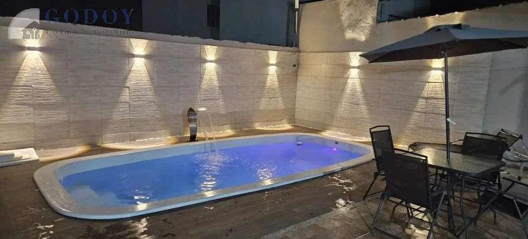 Imagem Casa moderna com 3 dormitórios, suíte, área gourmet e piscina aquecida