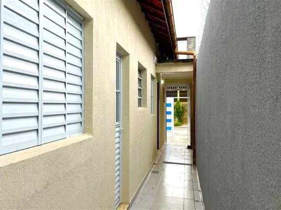Imagem Casa com 2 dormitórios à venda, 130 m² por R$ 400.000 - Caiçara - Praia Grande/SP