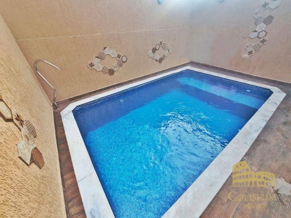 Imagem Casa com 2 dormitórios à venda, 94 m² por R$ 700.000,00 - Vilamar - Praia Grande/SP