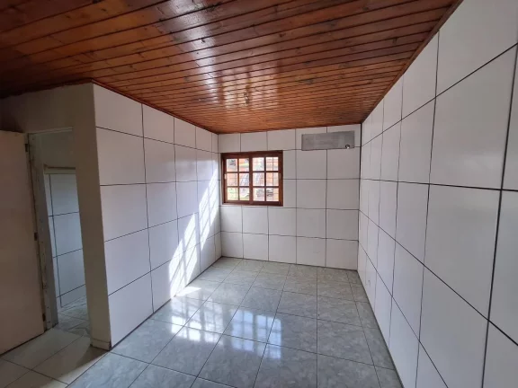 Imagem Casa com 91m², dois dormitórios, garagem, Lomba Tarumã, Viamão/RS.
