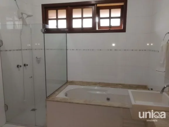Imagem Casa 4 dormitórios (2 suítes), banheira de hidro, piscina, garagem