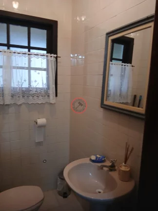 Imagem CASA A VENDA DENTRO DE CONDOMÍNIO EM FRENTE A PRAIA, COM 2 DORMITÓRIOS,VARANDA, JARDIM, CHURRASQUEIRA E 2 VAGAS PARA CARRO
