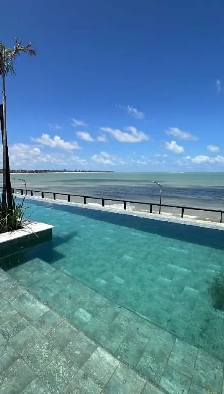 Imagem Alto Padrão com Piscina Infinita e Potencial para Airbnb - Viva ou Invista com Inteligência