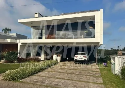 Foto do imóvel Excelente Casa Mobiliada para locação no Condomínio Reserva das Águas - Torres/RS