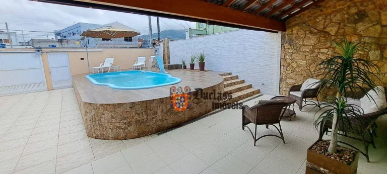 Imagem Sobrado com 4 dormitórios à venda, 246 m² por R$ 1.000.000,00 - Jardim Aruan - Caraguatatuba/SP