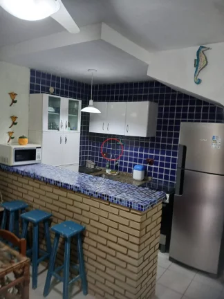 Imagem CASA A VENDA DENTRO DE CONDOMÍNIO EM FRENTE A PRAIA, COM 2 DORMITÓRIOS,VARANDA, JARDIM, CHURRASQUEIRA E 2 VAGAS PARA CARRO