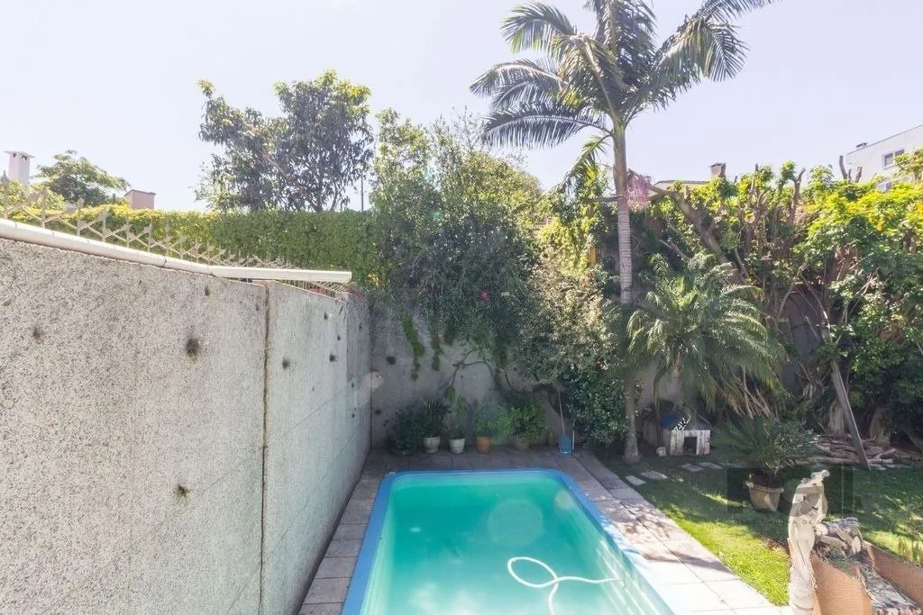 Imagem Casa 470m² - 4 dormitórios, 5 vagas no bairro Jardim São Pedro