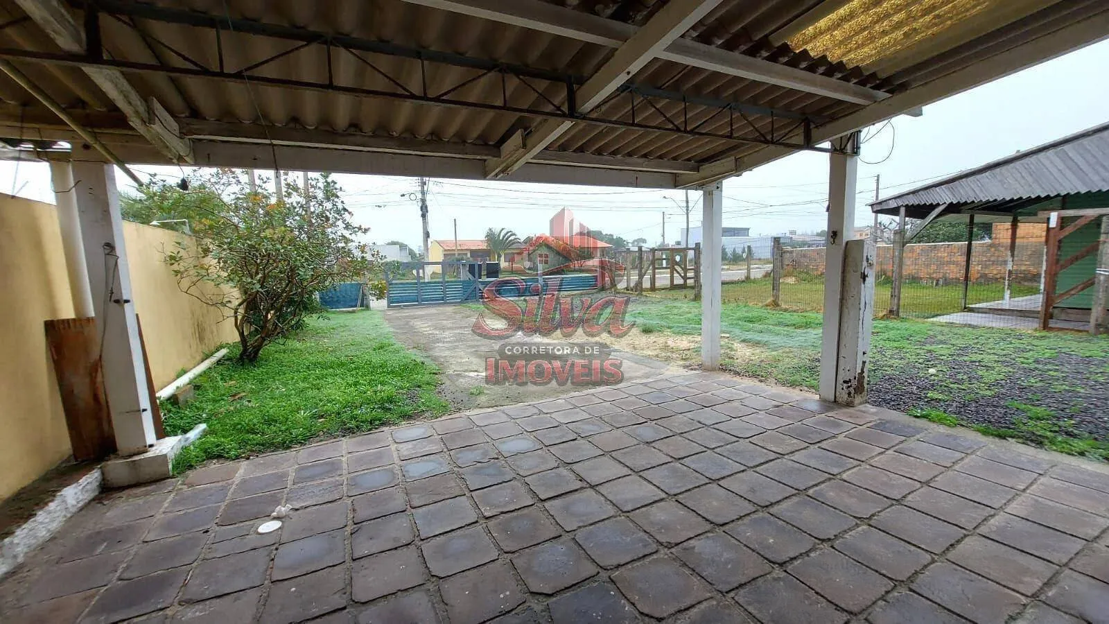 Imagem Casa com suíte à venda em Imbé com lareira e 103m²