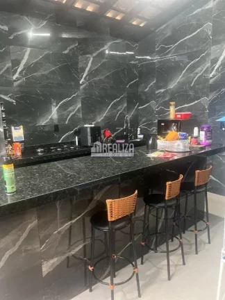 Imagem Casa à venda no Jardim Espanha, Uberaba | 2 dormitórios, suíte, piscina e varanda gourmet