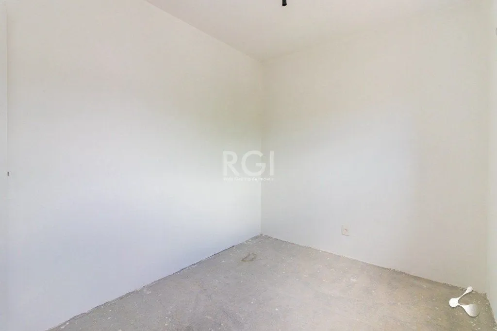 Imagem Vende apartamento, 03 dormitórios, living para dois ambientes, banheiro social, cozinha com churrasqueira e área de serviço e garagem.
