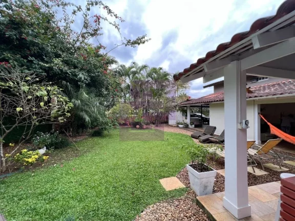 Imagem Casa à Venda no Condomínio Residencial Park Lane – 3 Suítes e Jardim com Árvores Frutíferas