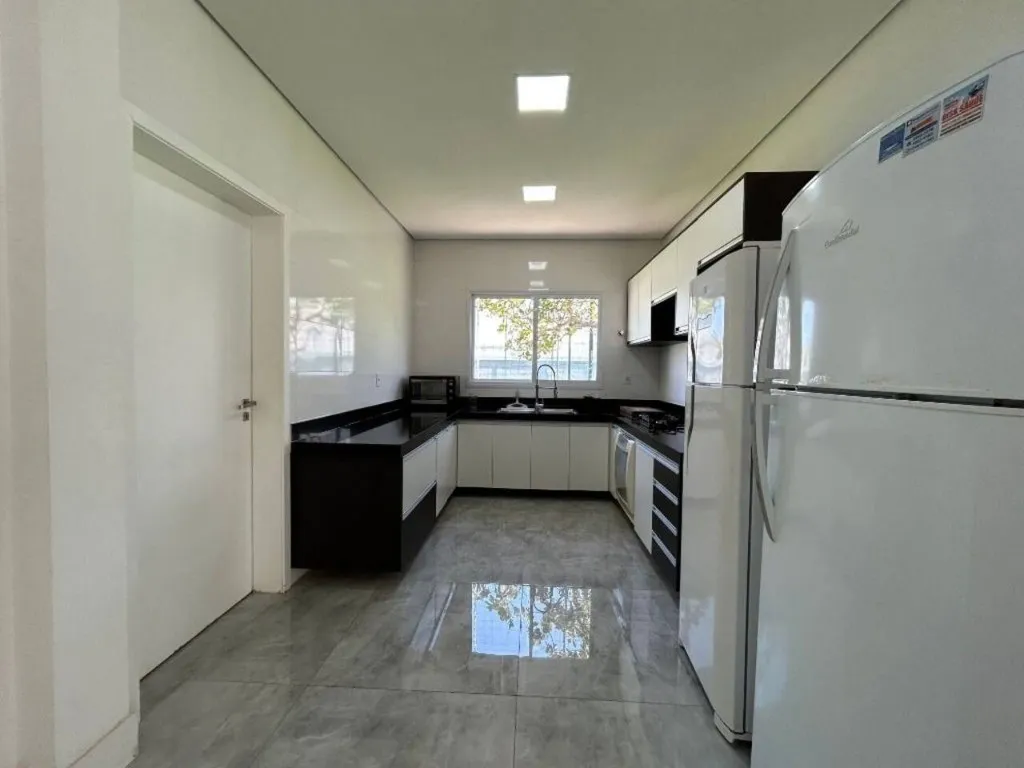 Imagem Alugar casa em condomínio em Jardim Acapulco Guarujá SP, casa á venda em Guarujá SP