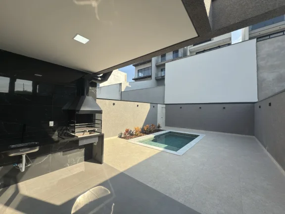 Imagem Casa a venda com 3 suítes, 4 vagas e piscina deslumbrante.