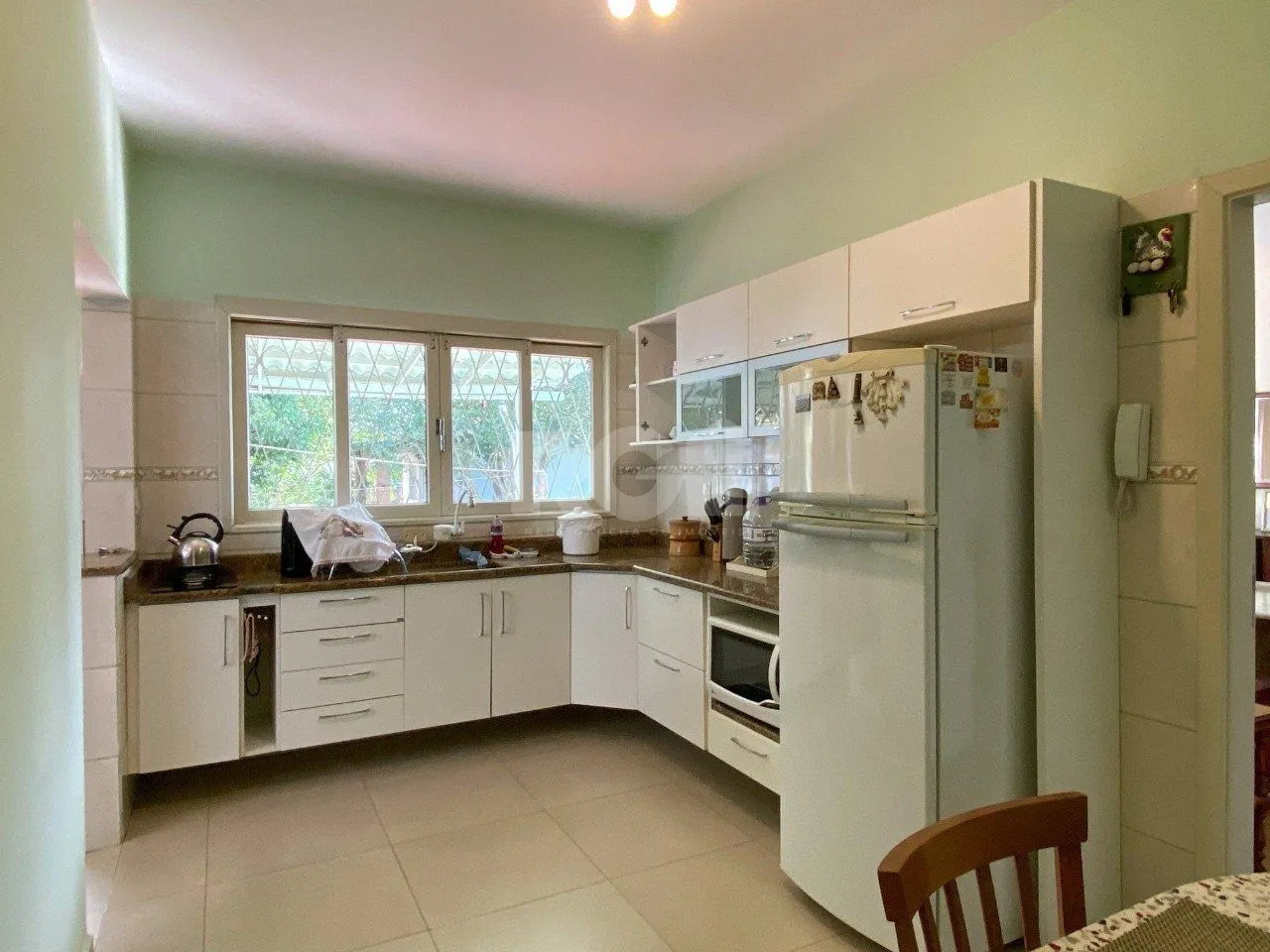Imagem Casa com 4 dormitórios, no bairro Nossa Senhora das Graças em Canoas/RS