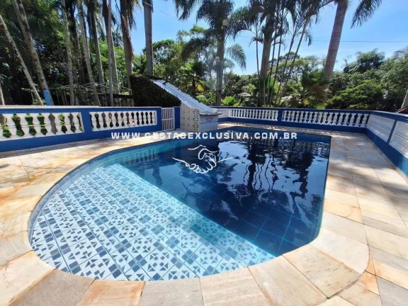 Imagem CHÁCARA GERANDO RENDA COM 10Mil m² 4 CASAS PISCINA ÁREA GOUMET COMPLETA