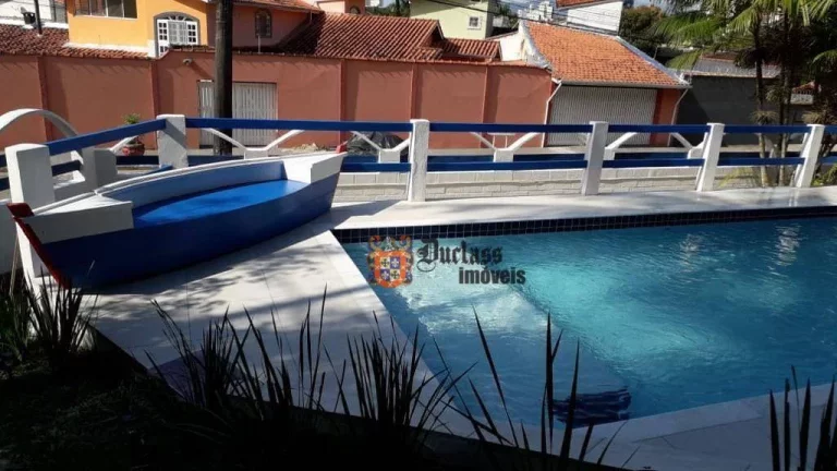 Imagem Casa com 3 dormitórios à venda, 290 m² por R$ 1.600.000 - Prainha - Caraguatatuba/SP