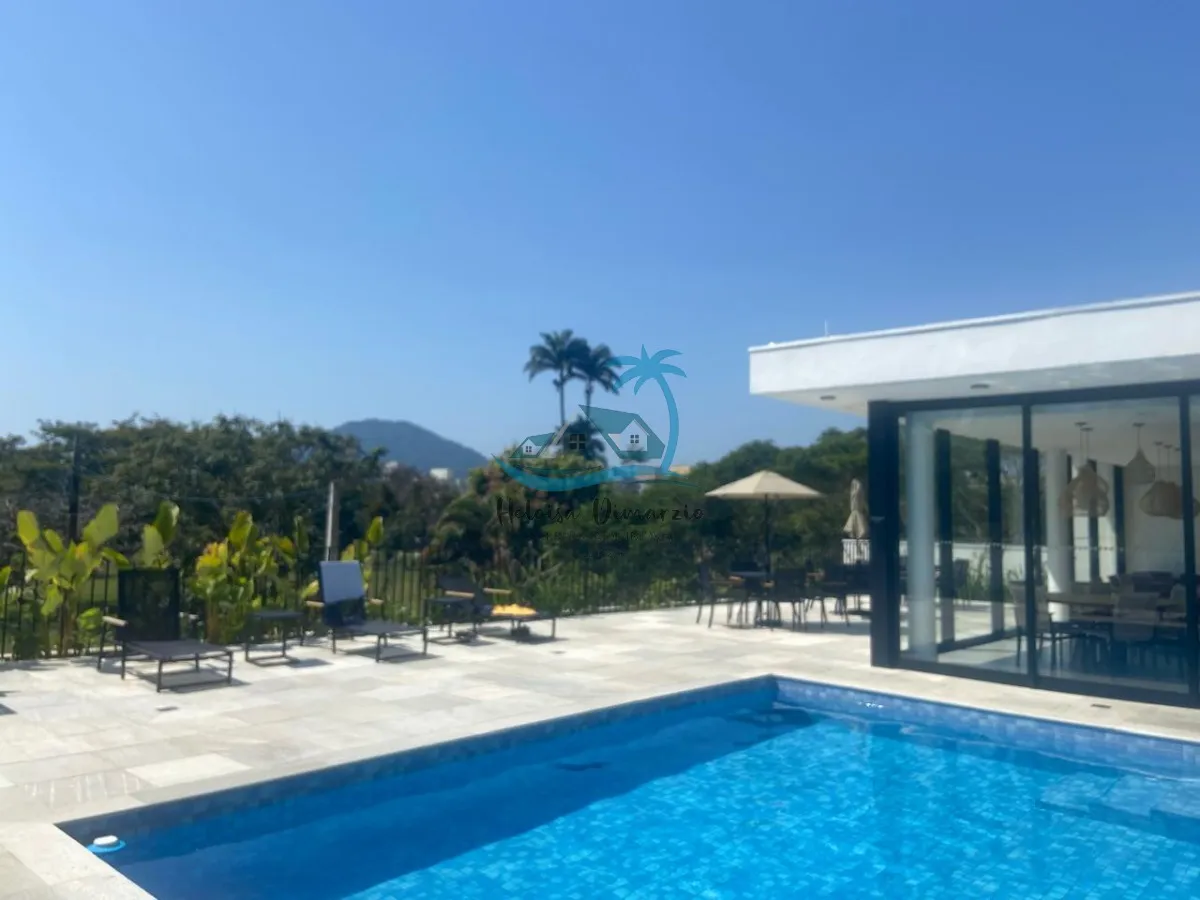 Imagem Casa nova com 2 suítes a venda em condomínio fechado a 500 metros da orla do Itaguá em Ubatuba