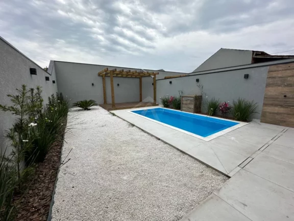 Imagem SOBRADO COM PISCINA, 3 QUARTOS SENDO 1 SUÍTE COM CLOSET, ITAPEMA DO NORTE