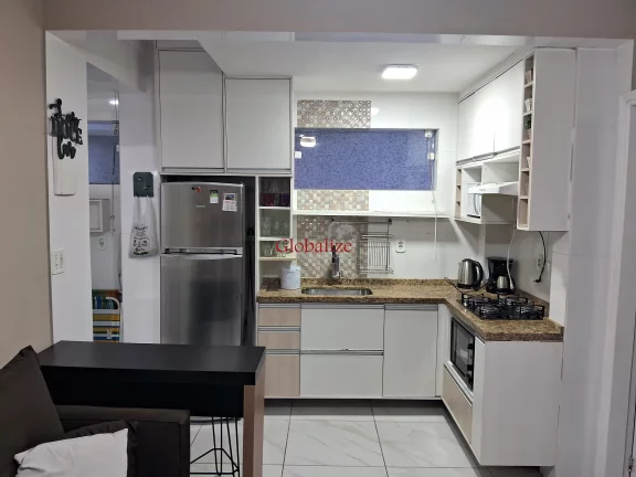Imagem Belíssimo apartamento de 2 dormitórios em Santos no José Menino na avenida da praia à venda por R$ 480.000,00