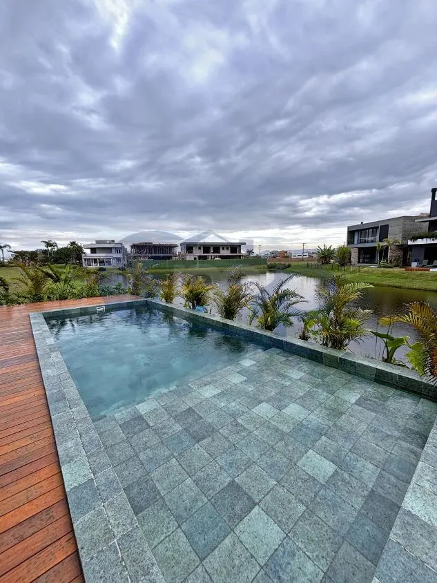 Imagem Casa de 4 suites com piscina a venda no Condominio Ilhas Park, Guarita, Torres/RS