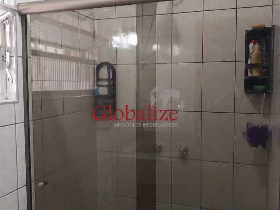 Imagem Casa térrea à venda com 125m², 2 quartos, churrasqueira, área coberta, vaga de garagem coberta por R$390.000,00 em Santos