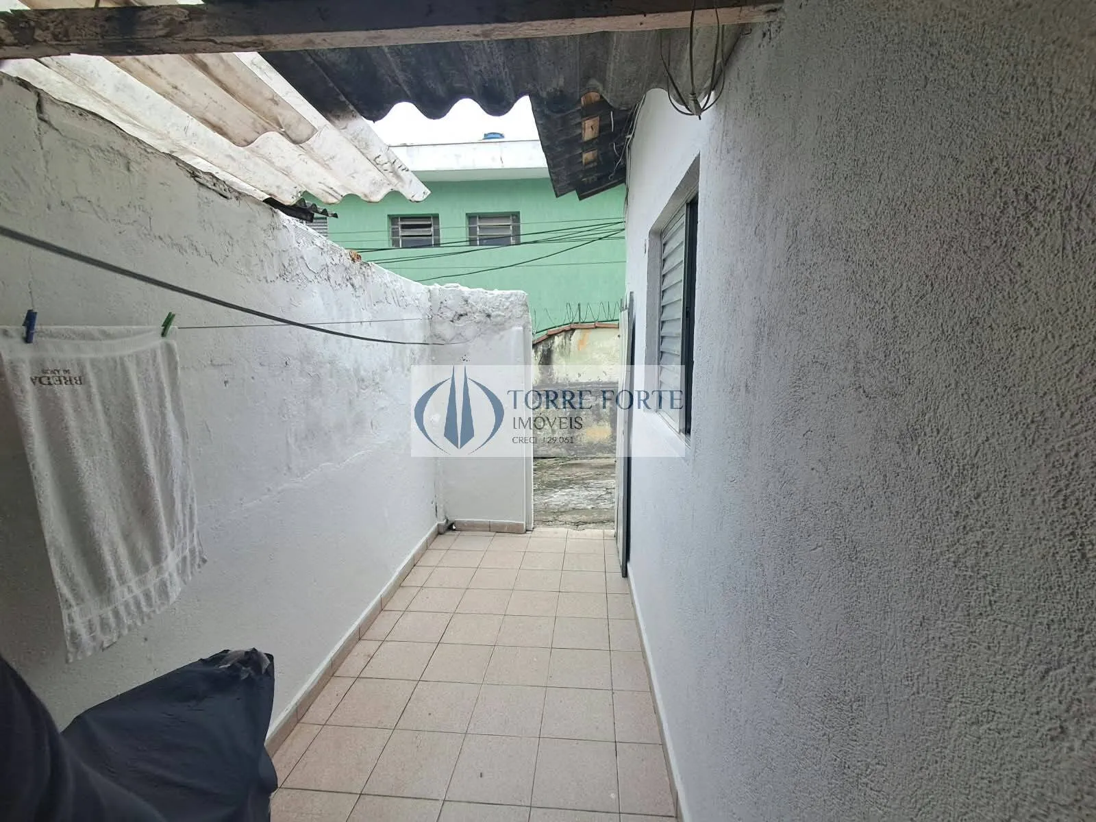 Foto do imóvel Terreno com 2 casas em Rua Planeta