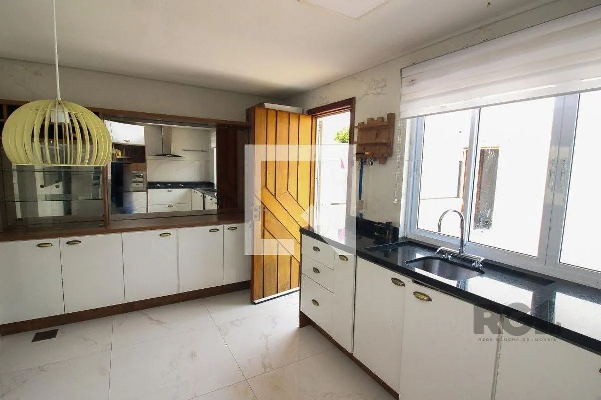 Imagem Casa 4 dormitórios à venda Partenon Porto Alegre/RS