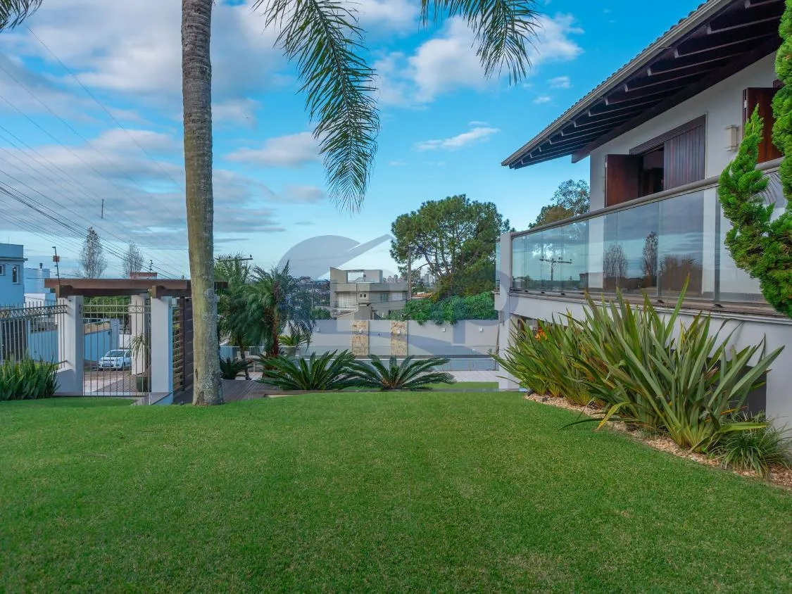 Imagem Casa de Alto Padrao com 4 Dormitorios, Piscina Aquecida e Espaço Gourmet no Centenario, em Torres/RS