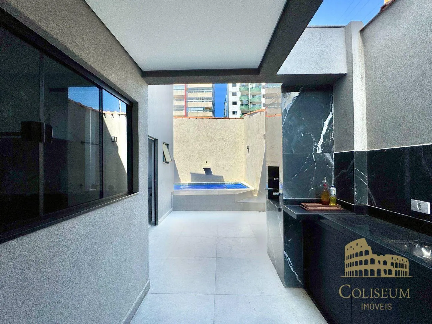 Imagem Casa com 3 dormitórios à venda por R$ 935.000,00 - Aviação - Praia Grande/SP