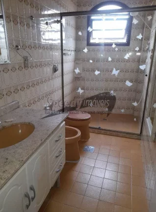Imagem Casa para venda em São Vicente, 3 dormitórios.