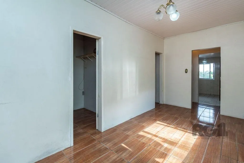 Imagem Casa de 4 dormitórios no bairro Camaquã