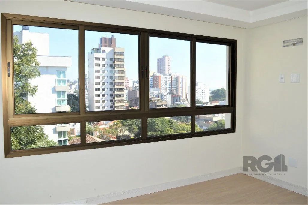 Imagem Lindo apartamento 2 dormitórios com 2 suítes, lavabo, vaga de garagem, amplo living 2 ambientes e cozinha com churrasqueira.