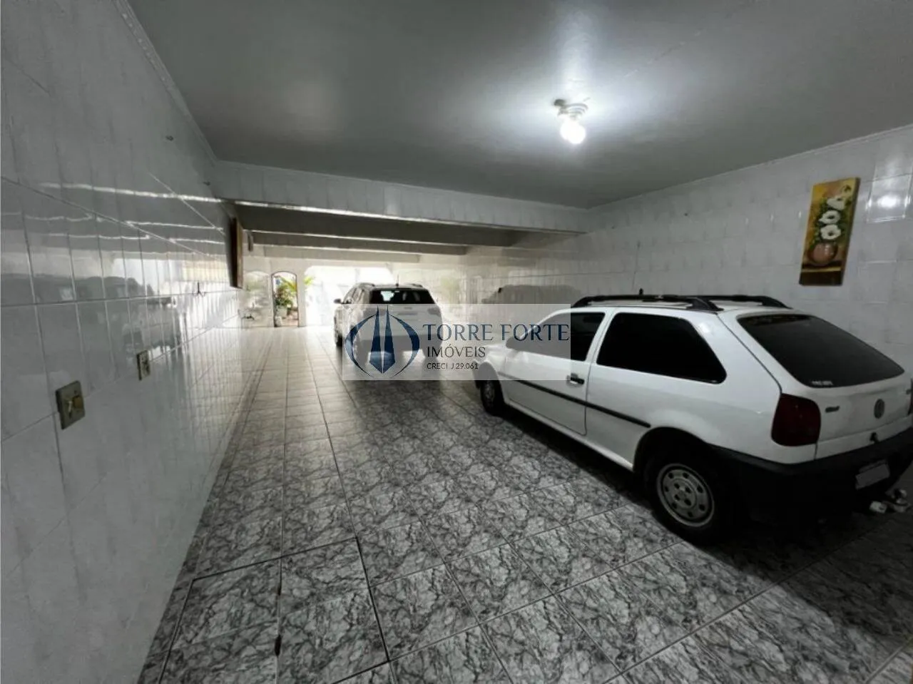 Foto do imóvel ótimo terreno com 2 casas com total de 3 dormitórios, 6 vagas de carro em Rua Itália