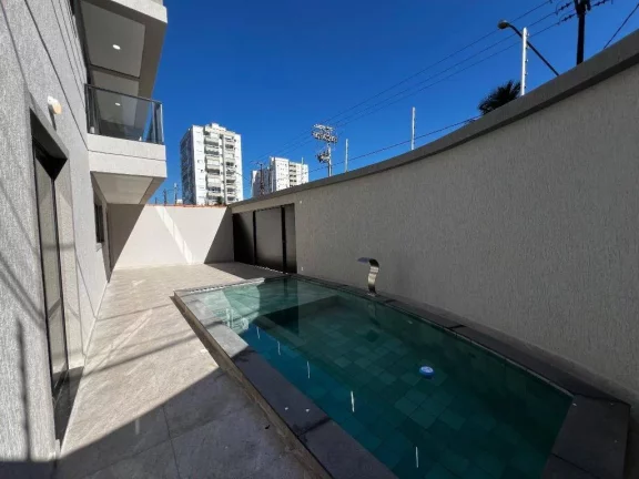 Imagem Sobrado com 3 dormitórios à venda, 127 m² por R$ 990.000,00 - Vila Guilhermina - Praia Grande/SP