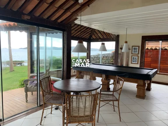 Imagem Casa de Luxo à Beira-Mar em Búzios, Condomínio Camurupim na Praia Rasa: 6 Quartos, 6 Suítes, 4 Salas - Segurança e Conforto!