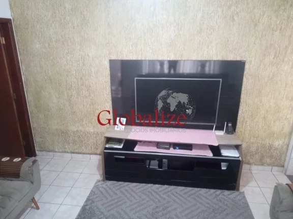Imagem Casa térrea à venda com 125m², 2 quartos, churrasqueira, área coberta, vaga de garagem coberta por R$390.000,00 em Santos
