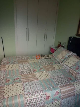 Imagem Apartamento com 2 dormitórios à venda, 74 m² por R$ 398.000 - Jardim Real - Praia Grande/SP