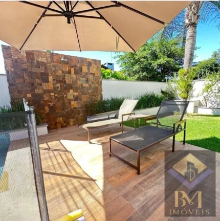 Imagem Belíssima casa de altíssimo padrão, combinando luxo, conforto sofisticação.