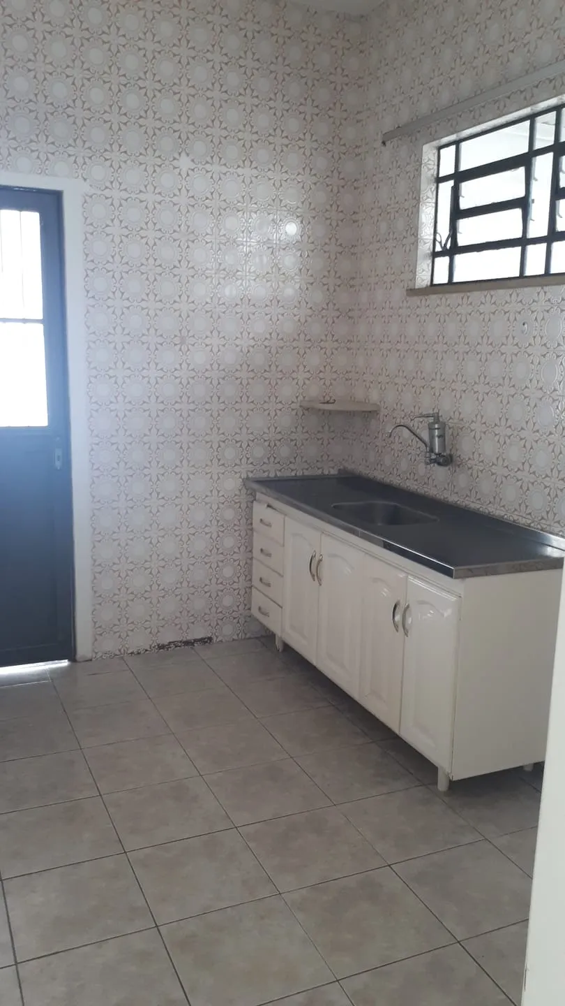 Imagem Casa Comercial no Centro com 2 Dormitórios, Edícula, Acessibilidade, Vaga de Garagem e Ideal para Consultório