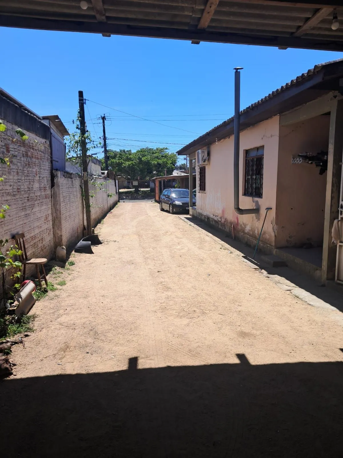 Imagem Terreno 11x160 com 2 casas
