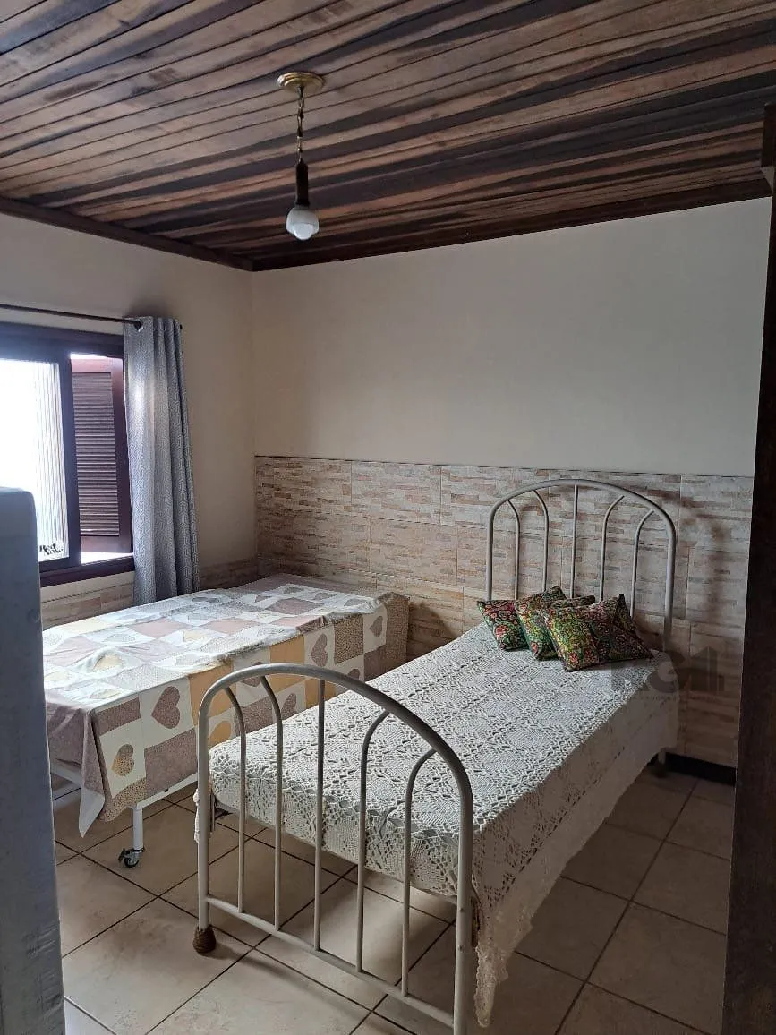 Imagem Casa 3 dormitórios, 1 suíte, vagas de garagem, Bairro Vila Marcia
